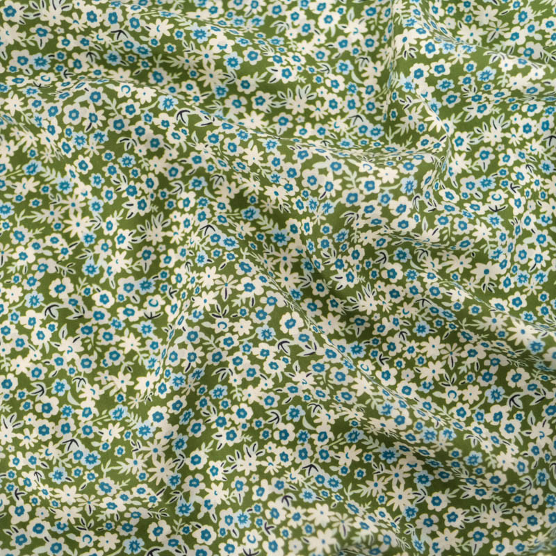 Viscose with a small blue floral print on a khaki background - Maison Klem
